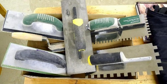 Three stainless steel notched trowels; 2 padded floats.