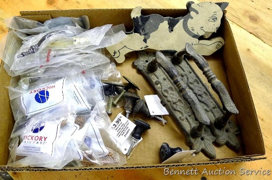 Pair of cast iron antique door handles are 9-1/4" long; lots of cabinet handles and knobs and more.