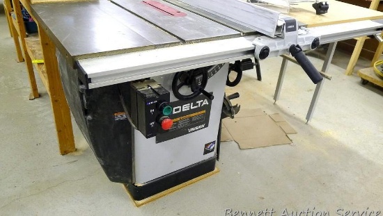 Delta 10" Unisaw table saw with heavy cast iron table, table extension, Unifence, more.