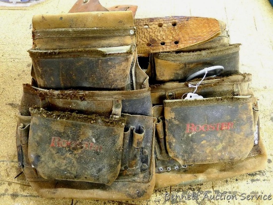 Leather tool belt has Rooster, Stanley, and Nicholas pouches. Belt is about 47" long and comes with