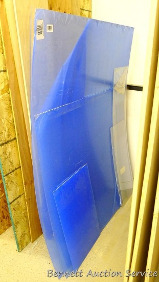 Pieces of 1/8" plexiglass. Largest is 48" x 60".