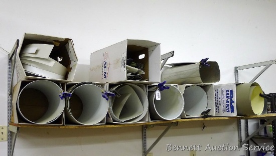 Shelf of partial rolls of aluminum trim coil up to 24" wide.