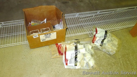 Two 12' sections of wire shelving; pkgs. Of wall end brackets, 12" support braces, back clips and