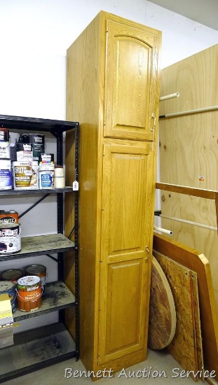 Really nice storage cabinet is 18" x 24" x 95". Has 5 shelves in bottom section and 2 shelves in