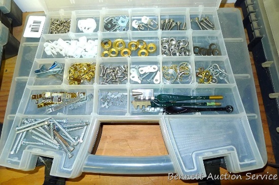 Organizer 11" x 15" filled with assortment of grommets, hangers, screws and nails.