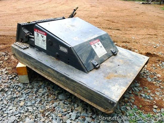 Bobcat brand 5' Brush Cat mower with quick connect plate. Model Brush Cat 60. Stored under roof.