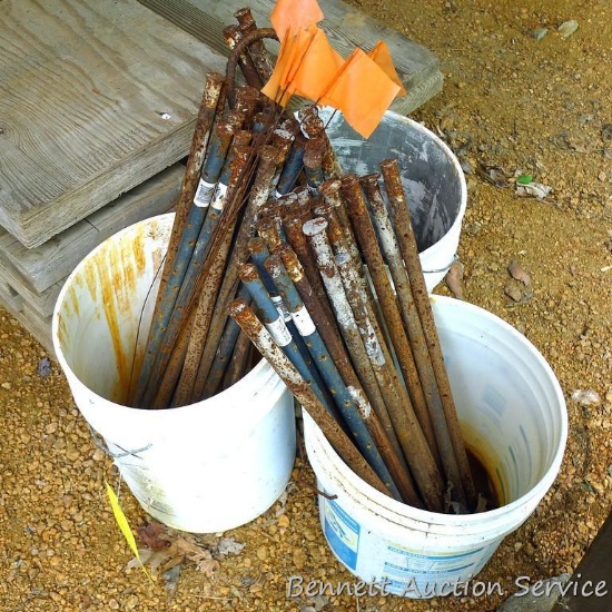 Around 48 cross drilled concrete form stakes, each about 2' long.