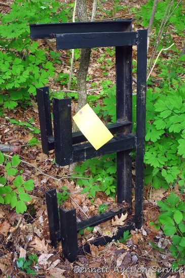 Welded steel angle iron stock brackets mount on wall. 3' x 16".