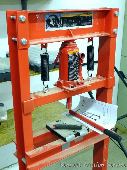 Titan 12 ton shop press is 20-1/2" x 54" tall; 5 gallon bucket with scrap iron. Comes with 28" x 36"