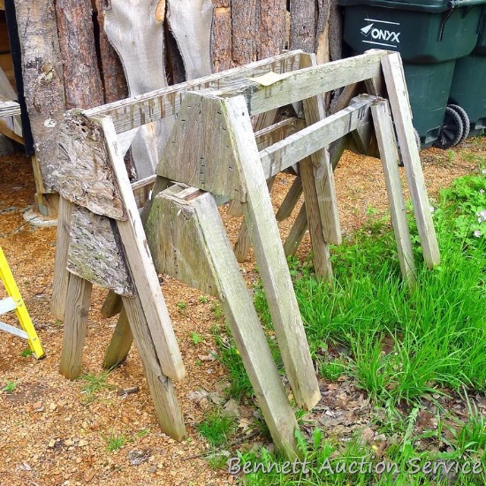 Four saw horses each approx. 32" high x 4' wide.