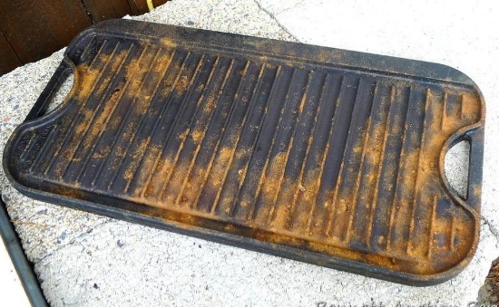 Lodge cast iron griddle is 20" x 10-1/2".