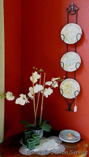 Table and wall display includes faux orchid, 30" high; decorative plate rack, nearly 4' high; seven