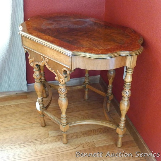 Pretty antique side table is in good shape. Table has birds eye maple accent on top. Measures
