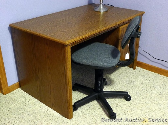 Nice smaller sized office desk and rolling chair. Desk measures approx. 48" x 28" x 28" high.