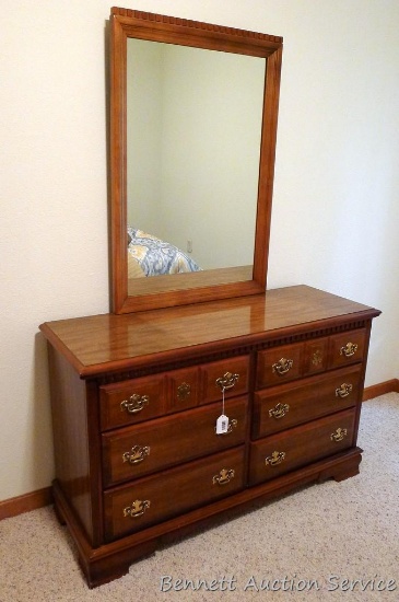 Bassett Furniture six drawer dresser with mirror. Bottom portion measures 50" wide x 18" deep x 31"