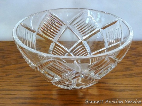 Leaded crystal serving bowl rings clearly and is 9-1/2" diameter. No chips or cracks noted.