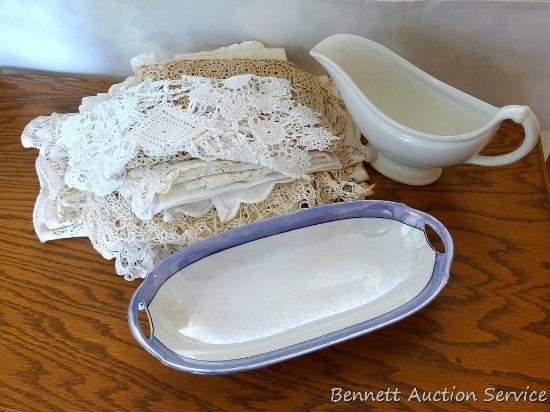 Variety of doilies and runners up to 4' long; Bavarian china serving piece is marked on bottom