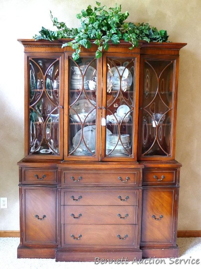 Beautiful antique china hutch is in good condition, glass and trim are intact. Measures 6'8" high x