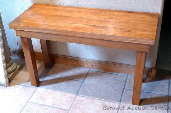 Sturdy little bench or side table measures approx. 34" x 14" x 21" high.
