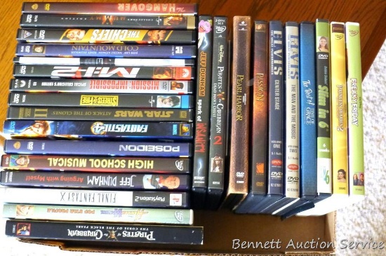 DVDs including Fantastic 4, Pirates of the Caribbean, High School Musical, Pearl Harbor, Freaky