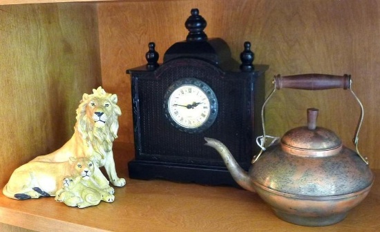 Neat copper tea kettle is marked 'Portugal', stands approx. 8" to wooden handle. Wicker-look mantle