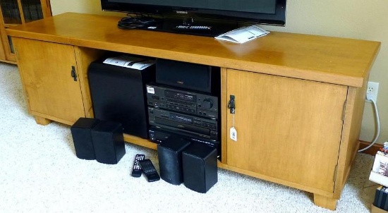 Nice entertainment cabinet is sturdy and in very good condition. Each door contains to slide out