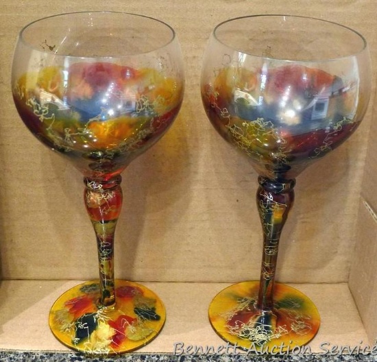 Two unique hand painted goblets are each 8-1/4" tall.