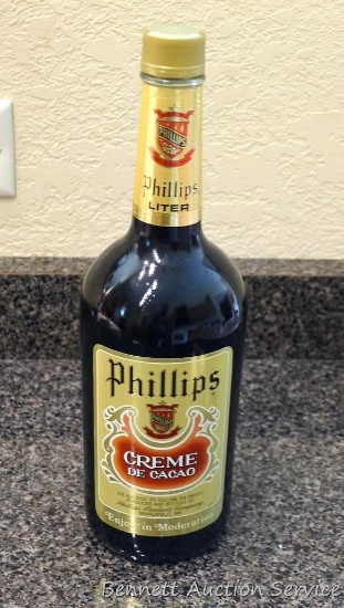 No shipping. One liter bottle of Phillips Creme de Cacao liqueur.