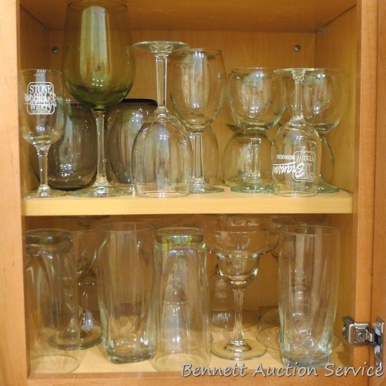 Assorted barware including margarita glasses, martini glasses, iced tea tumblers, wine glasses, etc.