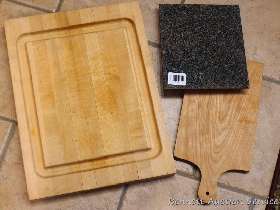 Nice solid wooden cutting board measures 18" x 14" x 1-1/4"; other smaller cutting boards.