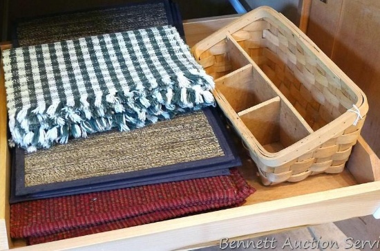 Three sets of placemats; wicker organizer basket measures 14" wide x 6-1/2" high.