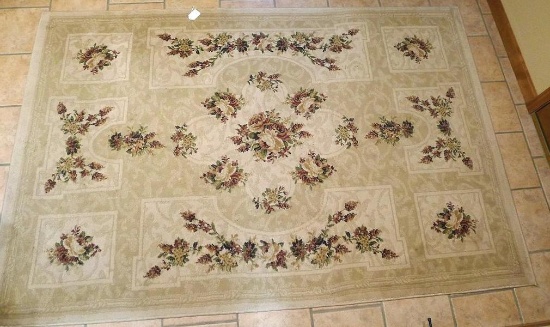 Area rug measures 7'9" x 5'2" and is in very good condition. Nice muted colors.