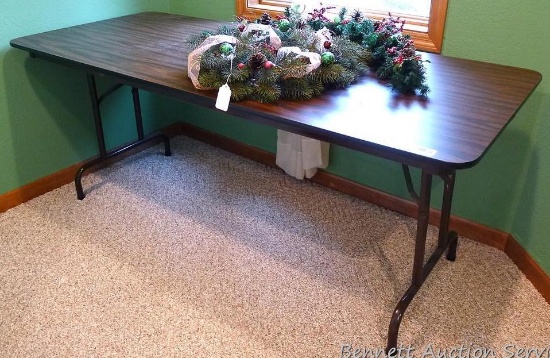 Sturdy 6' folding table is in good shape, 30" wide x 28" high.