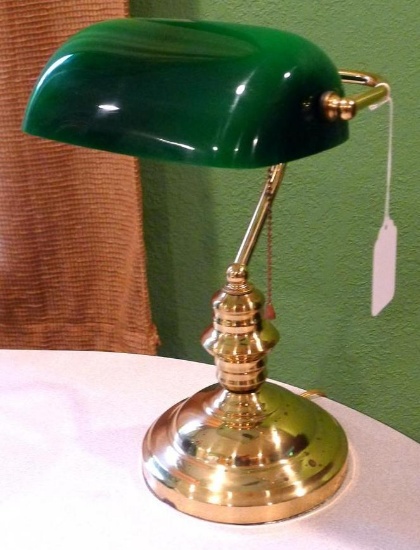 Banker's style lamp is in good condition. Stands nearly 15" high.