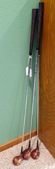 Vintage Wilson golf clubs with wooden heads. Nice display pieces.