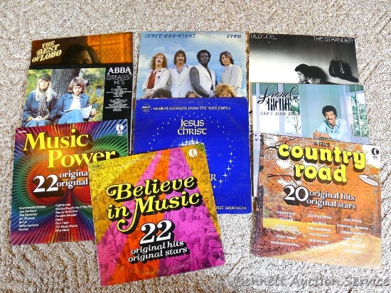 LP records including Billy Joel, Lionel Richie, Three Dog Night, The Best of Lobo, Jesus Christ