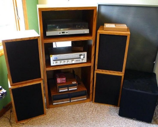 Nice stereo set up includes sturdy shelf, BIC turntable, Nikko NR-515 stereo, four speakers,