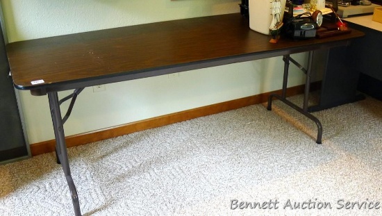 6' folding table is in very good condition. 30" wide x 29" high.