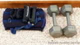 15 lb. dumb bells; leg weights may be about 5 lbs each; wrist and hand weights.