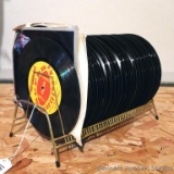 Quantity of vintage 33-1/3 rpm records with storage rack. Titles and/or artists include The Super