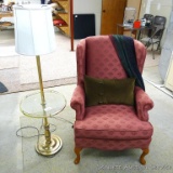Wing back chair is a classic design, comes with throw pillow, blanket throw and 4-1/2' tall floor