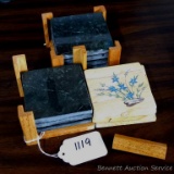 Seven green marble coasters with two holders; a set of sandstone or similar hand painted coasters