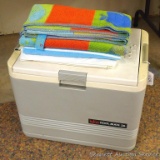 Igloo KoolMate 36 cooler with car adapter; two beach towels. Cooler is in good shape, measures 21