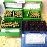 Over 150 rounds of various .303 British cartridges, plus four nice cartridge boxes.
