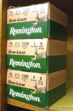 Three full boxes of Remington 16 gauge game load shotgun cartridges.