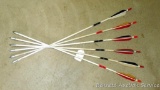 Six wooden arrows with field tips are 31