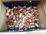 Partial box of Nosler .44 cal 200 grain hollow point jacketed handgun bullets.