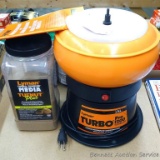 Lyman Turbo Pro1200 tumbler with manual and partial canister of Tuenut tumbling media. Tumbler