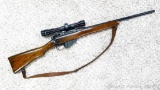 Sporterized British Enfield rifle with a 2-7x32 scope in Weaver side mount. See lot 257 for Enfield