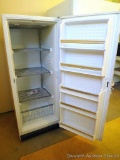 Wood's midsize upright freezer is 5' tall x 2' wide x 2-1/2' deep. Works. Comes with key to lock